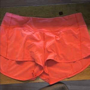 coral/pink lululemon shorts
